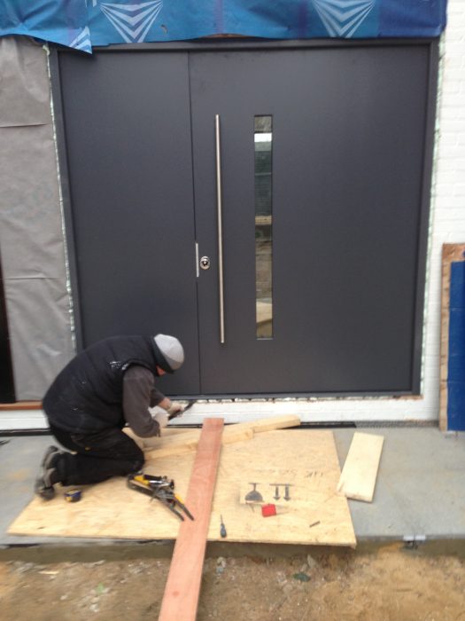 Fort North Designer Security Door On Award Winning House Being Fitted